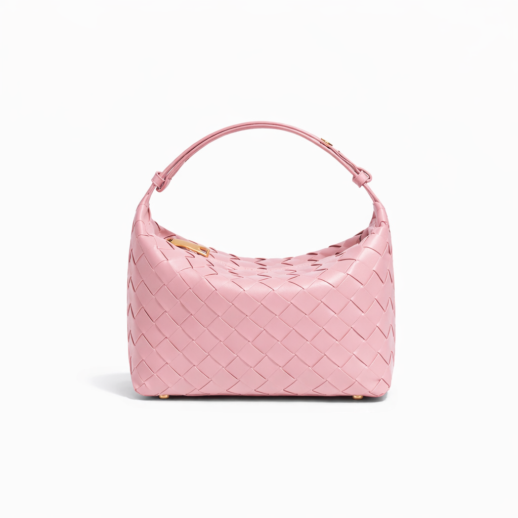 borsa kaila rosa in ecopelle hardware oro chiusura a zip molto capiente per la sua grandezza modello intrecciato con manico espandibile su sfondo bianco 
