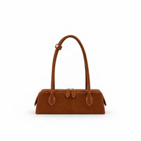 borsa nora in ecosuede cuoio con manici rigidi e lunghi per portare a spalla con hardware argento tasca interna con zip su sfondo bianco